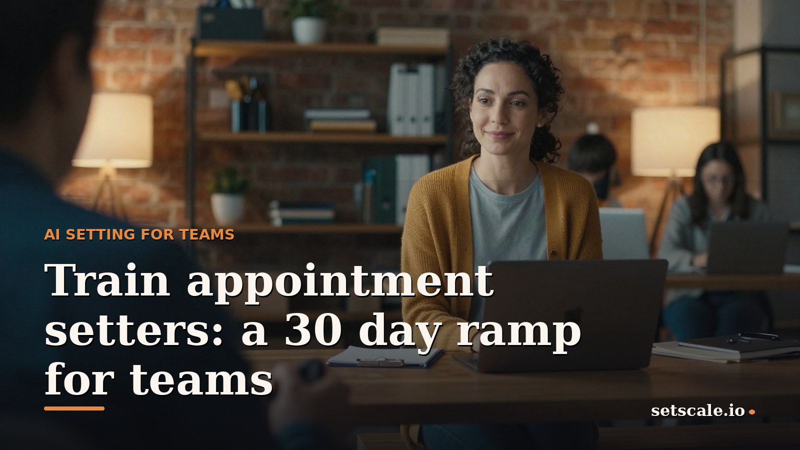 Woman in her early thirties running an onboarding session for a new appointment setter, dark curly hair tied back, mustard knit cardigan, seated on a wooden bench in a converted loft office with exposed brick and warm lamps, laptop and notebook on a low wooden table, second person out of focus beside her, soft morning light
